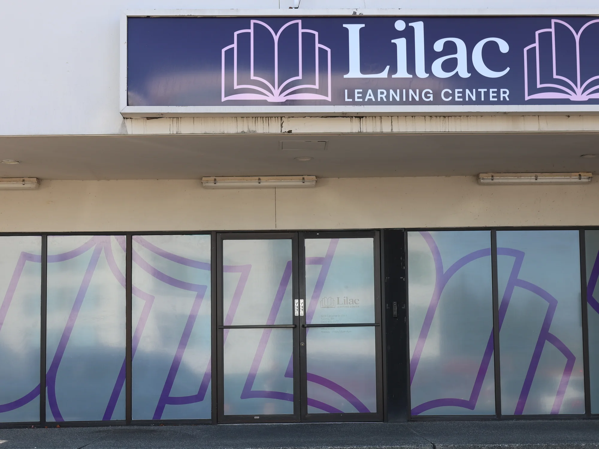 The Tacoma site from the parking lot, with the Lilac Learning Center sign above the entrance.